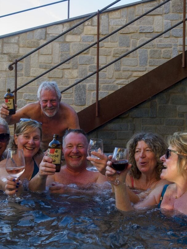 Skiers posing in the Dolomites
