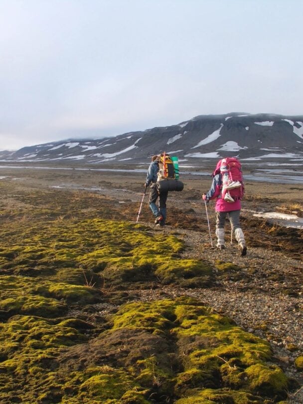 two hikers charcoal trail iceland