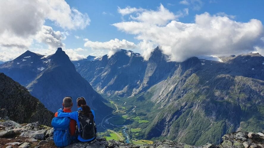 A couple of hikers on a top in Norway
