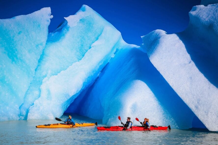 Kayaking near a big glacier in Patagonia