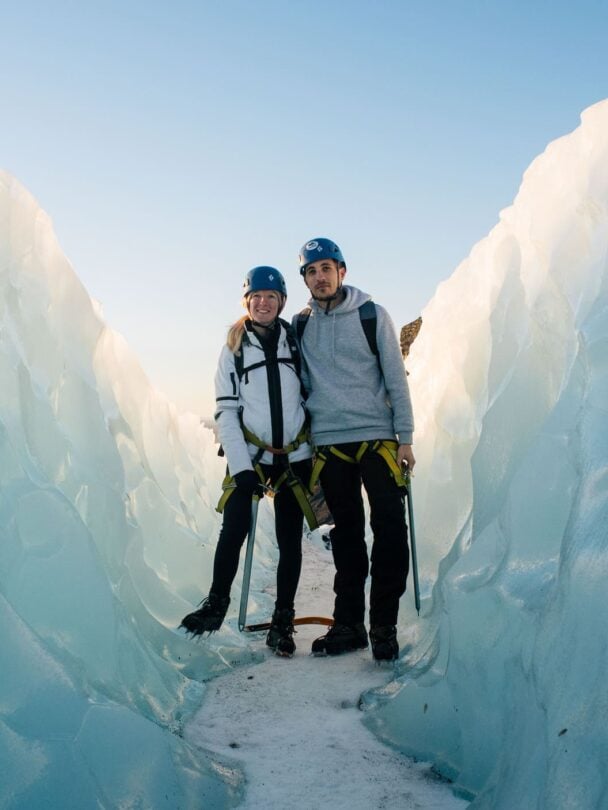 four hikers on a glacier