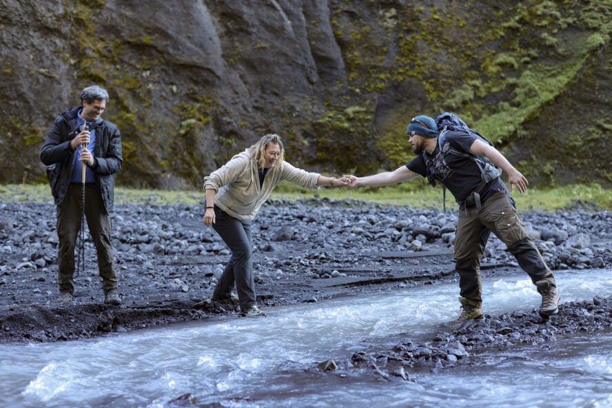 Guide crossing a river in Iceland