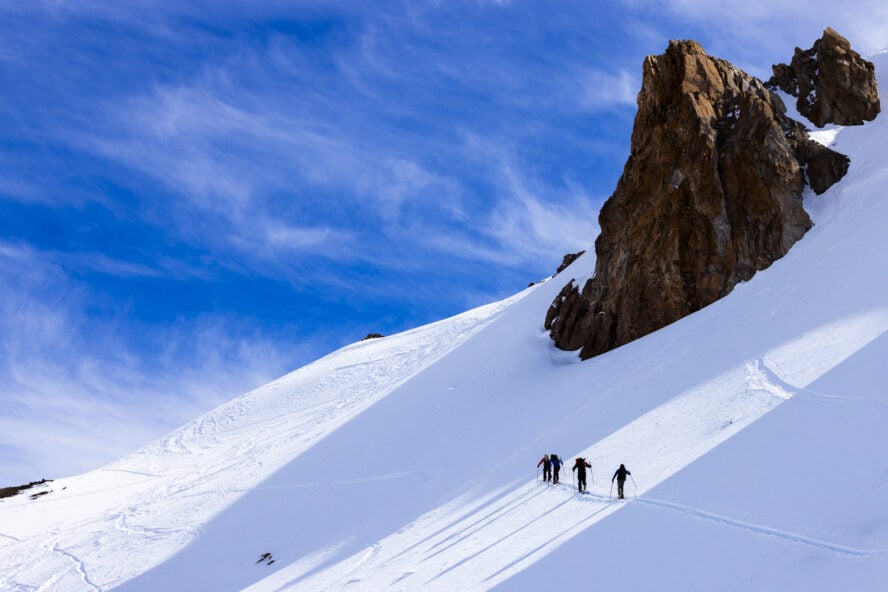 Backcountry skiing in Patagonia with three skiers
