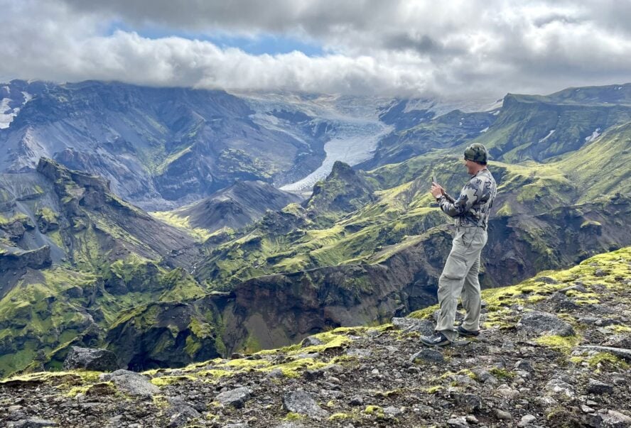 Hiker taking a photo in Iceland