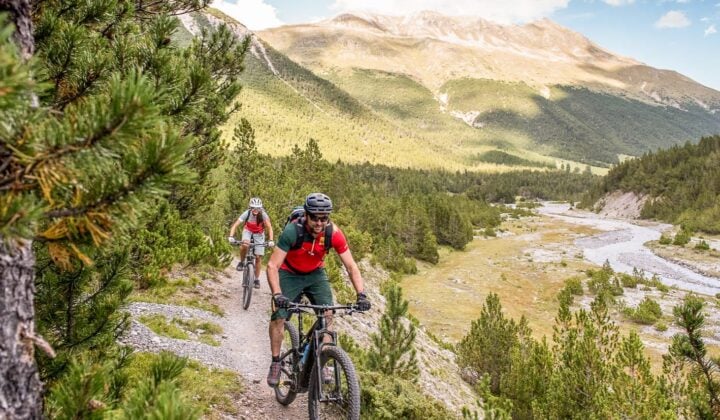 Through the UNESCO Biosphere Reserve from Switzerland to Italy — Mountain Biking in Switzerland, Austria, and Italy