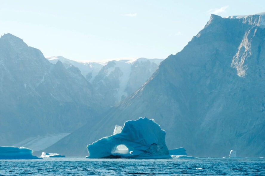 Cliffs and iceberg in Greenland