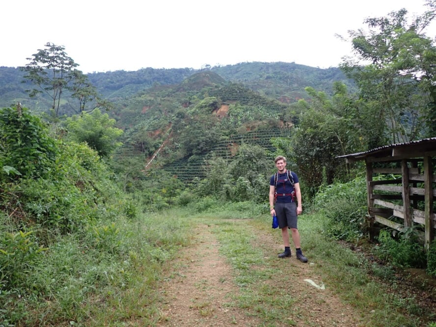 Hiker in a lush valley in Costa Rica
