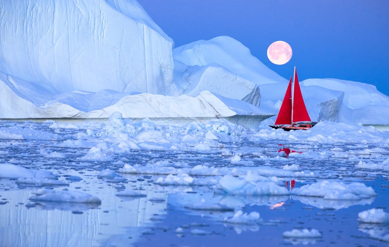 red sailboat in greenland