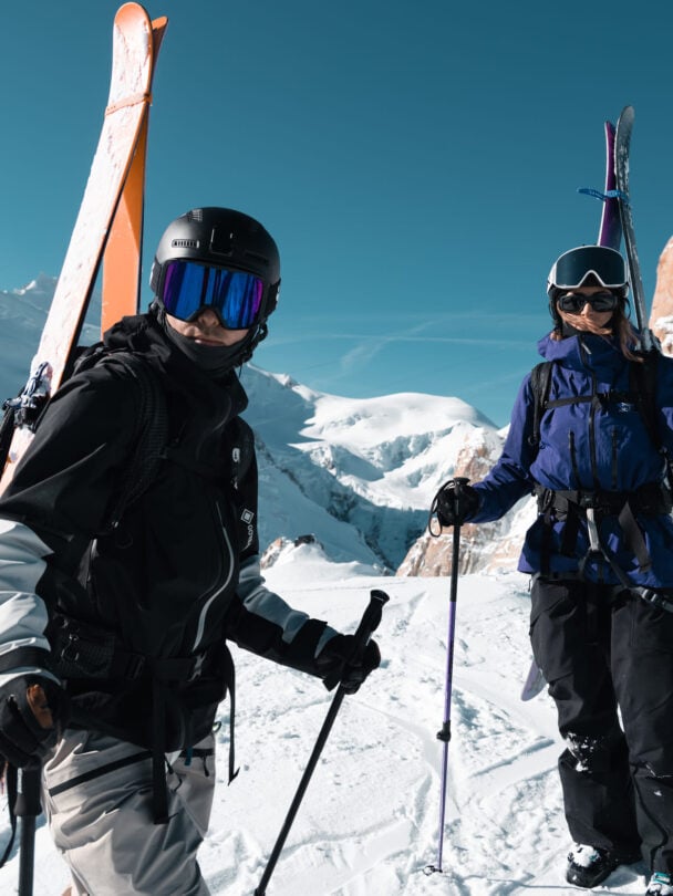 two skiers of faction